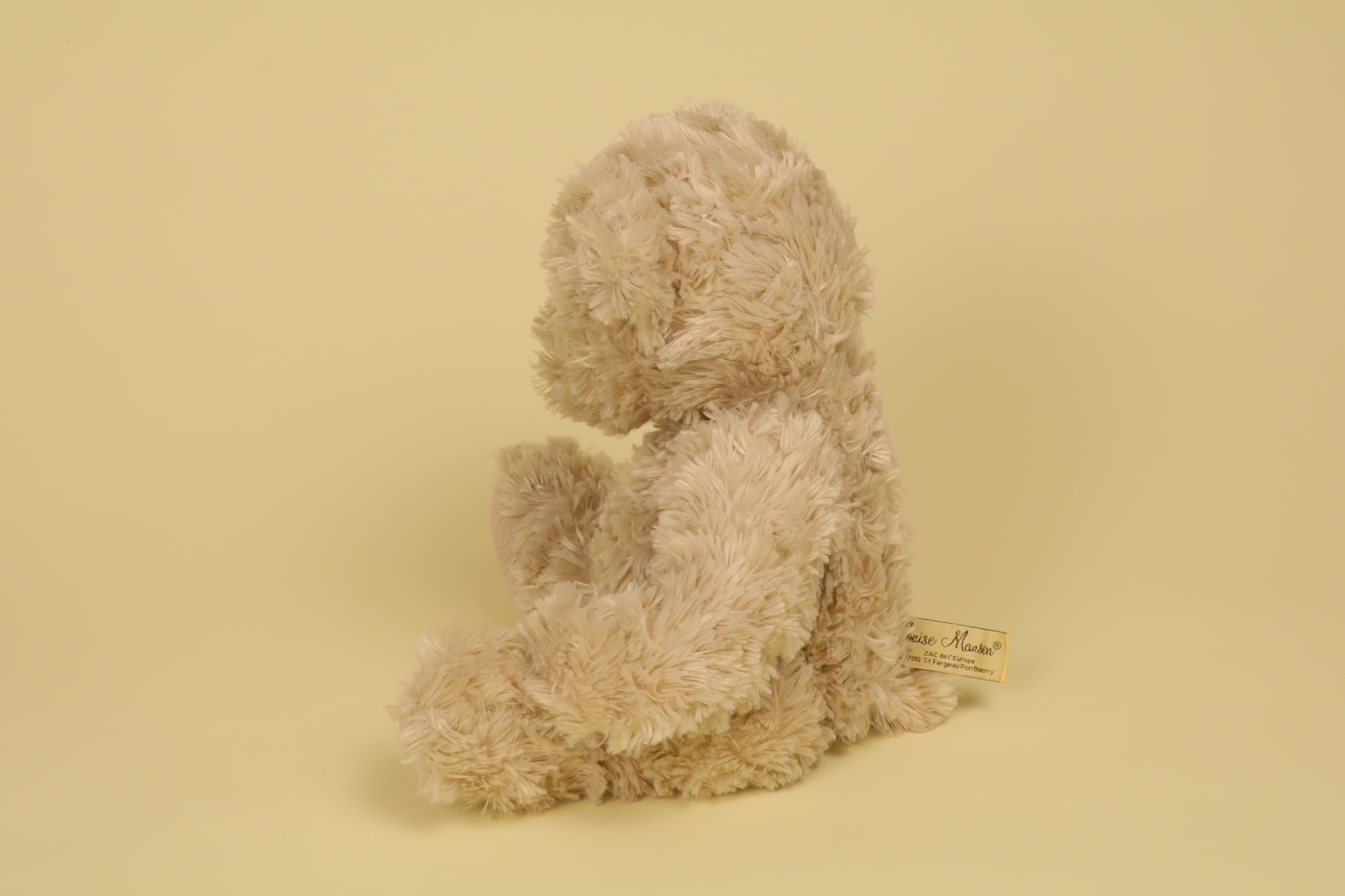 Peluche Ours Beige Assis profil