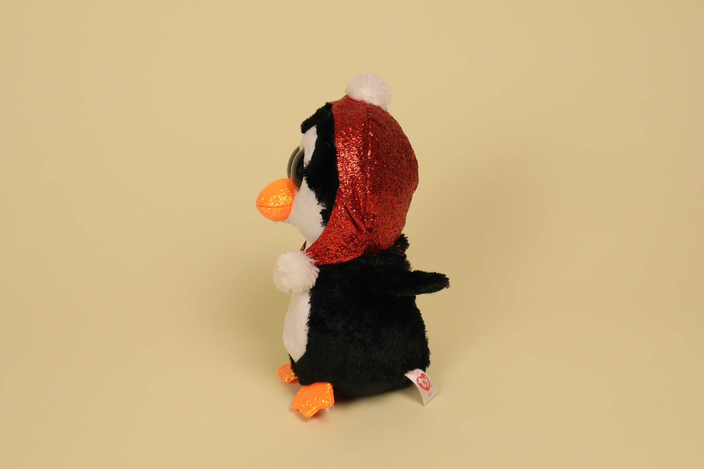 profil Peluche pingouin TY yeux bleus brillants bonnet rouge paillettes 16 cm doudou Noël Beanie Boos