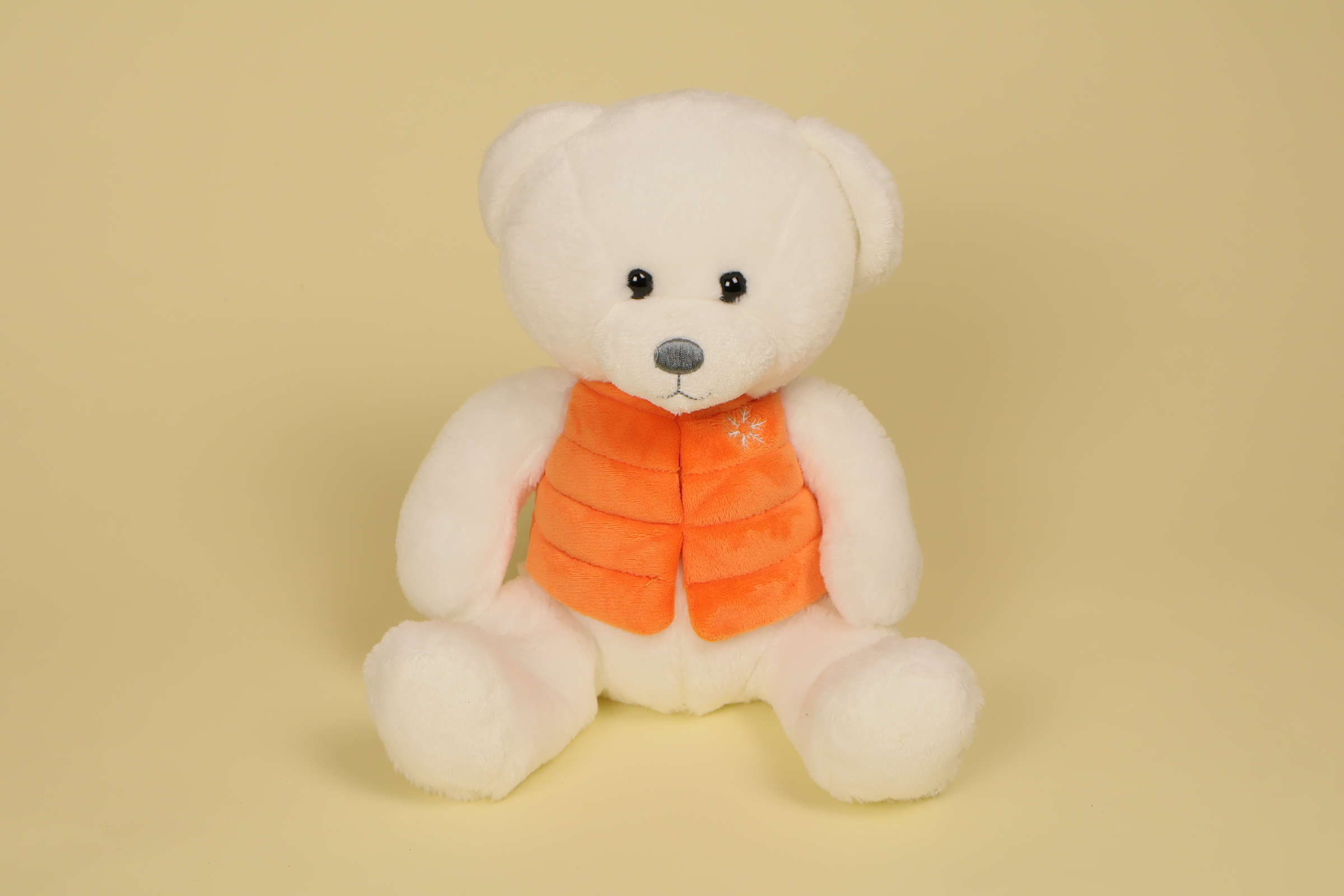 Peluche ours blanc 24 cm avec doudoune orange sans manche marque Gipsy doudou original
