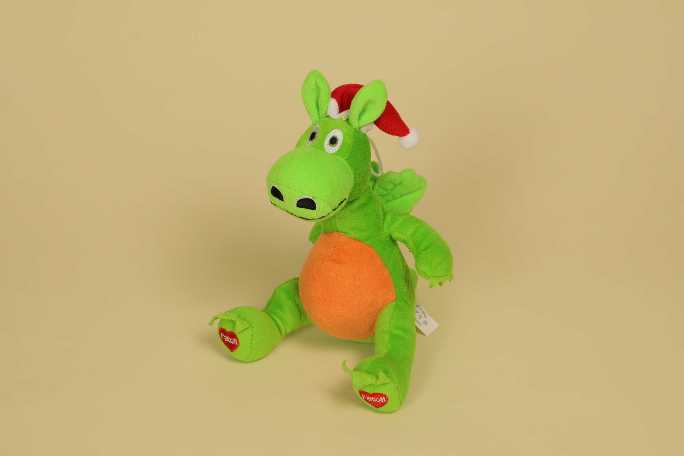 Peluche dragon vert 20 cm bonnet rouge de Noël broderie Ratoll marque Dragounet doudou fantastique