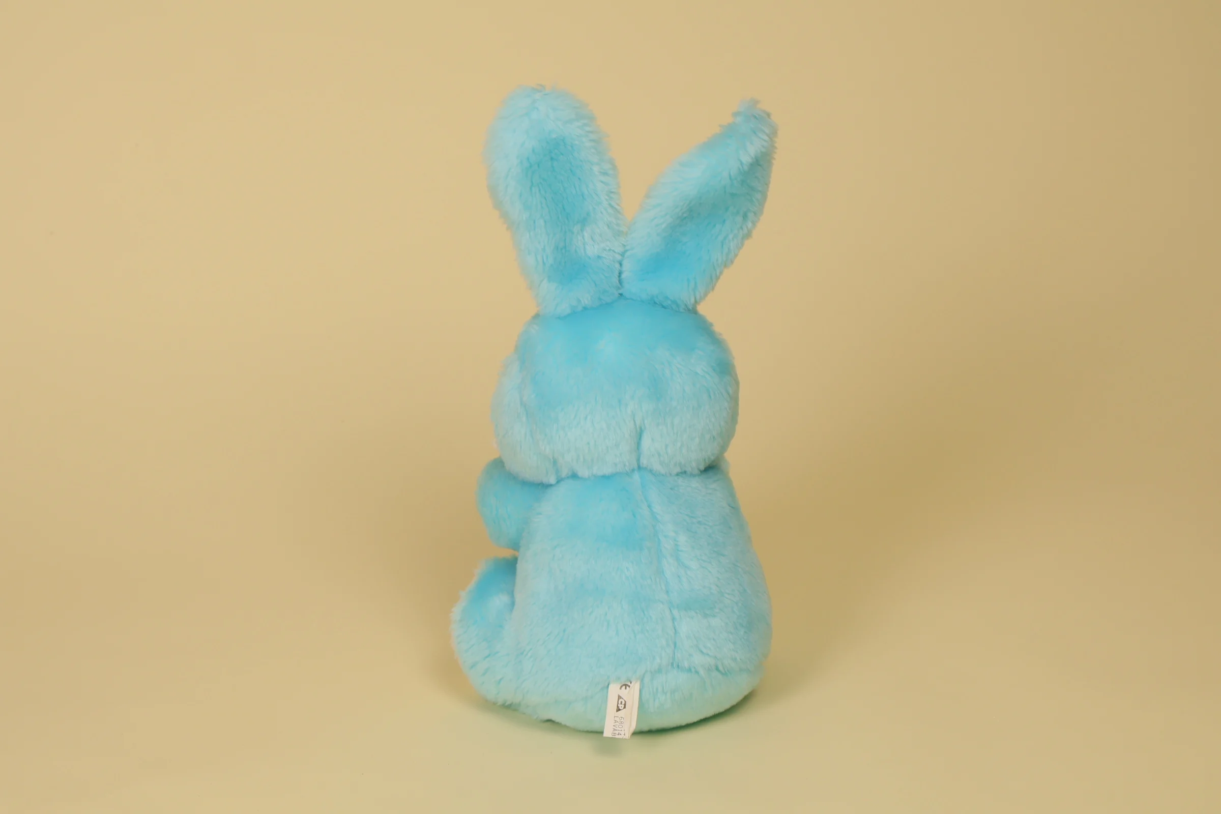 lapin bleu coussin fleur dos