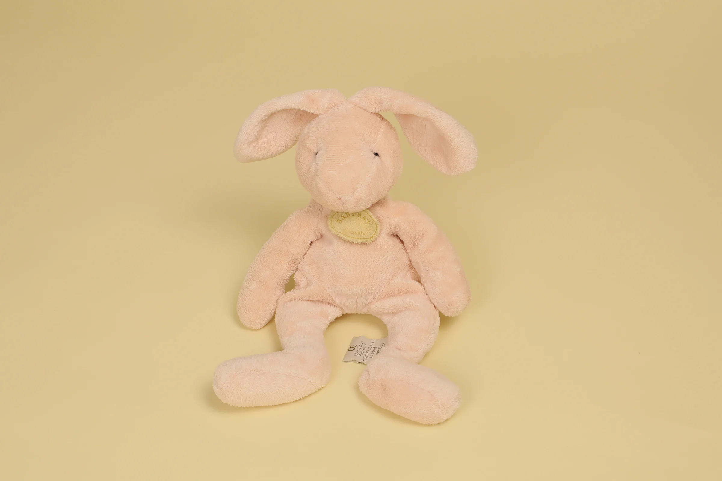 Doudou lapin beige 26 cm avec médaillon de marque collection classique Baby Nat' peluche bébé