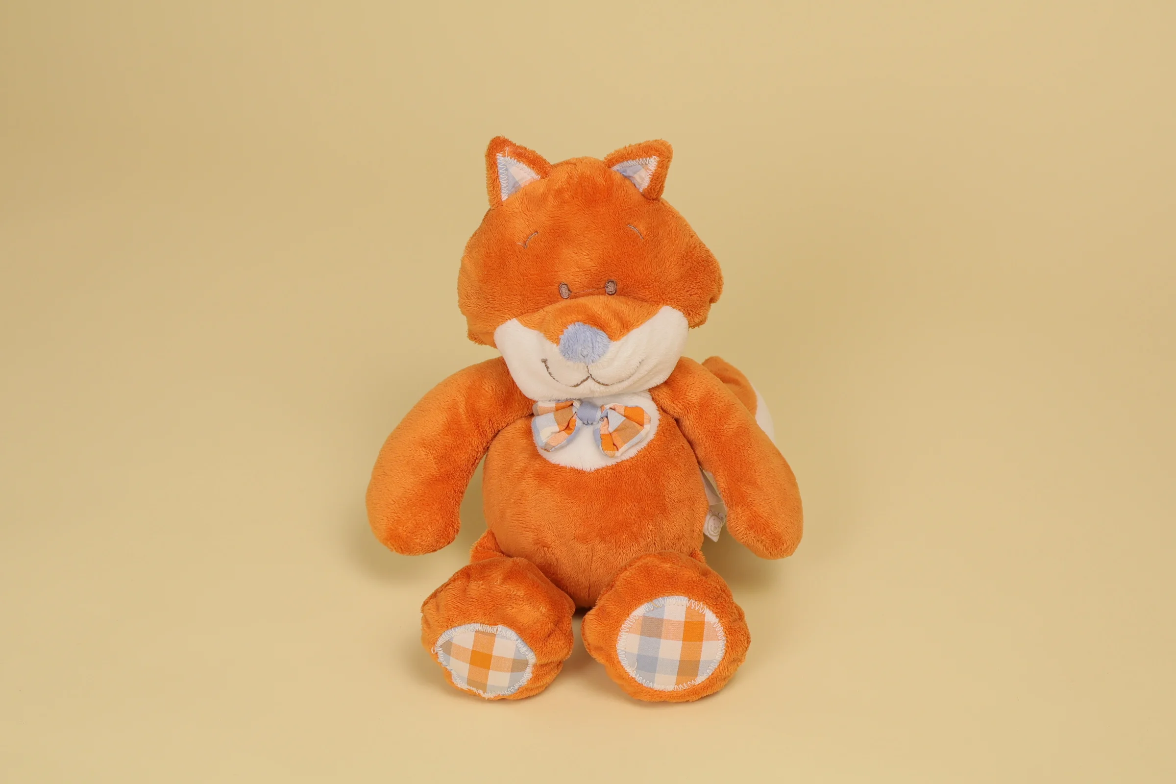 Doudou plat renard Henry orange et blanc 27 cm collection Charlie William et Henry marque Noukie's avec tissu à carreaux