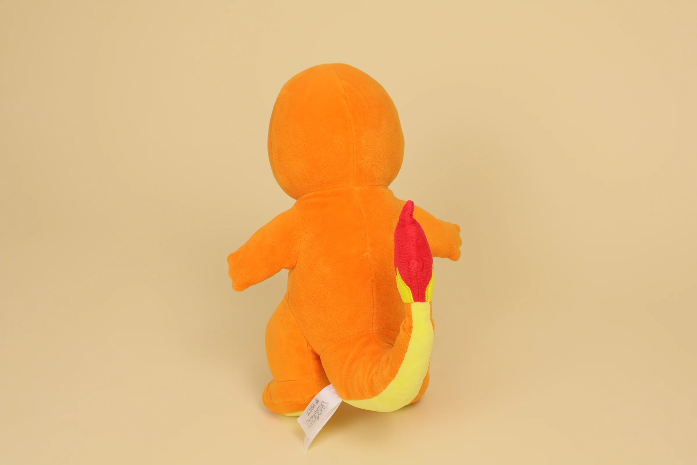 Dos Peluche Pokémon Salamèche orange 28 cm marque WCT Wicked Cool Toys doudou type feu Charmander