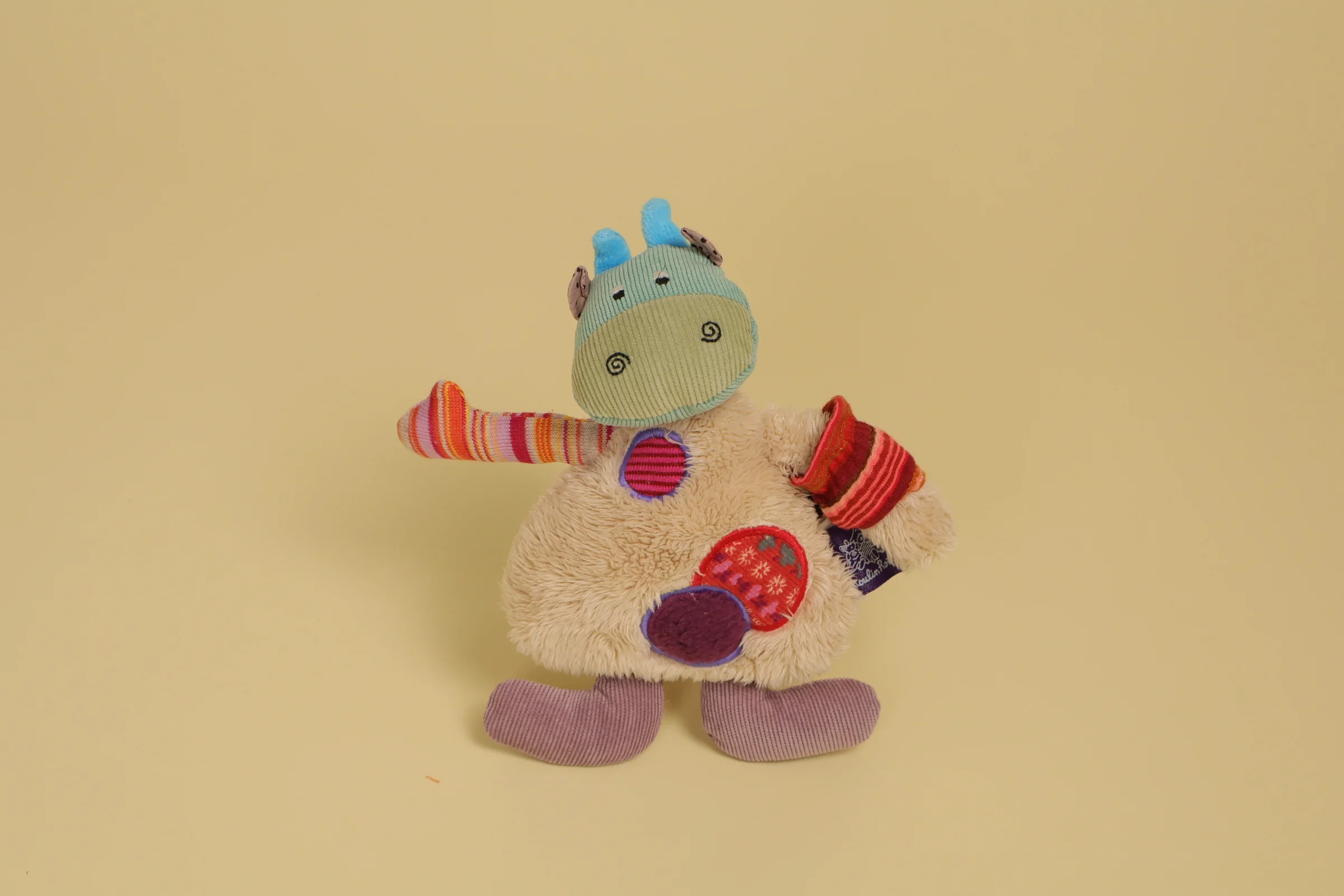 Doudou vache semi-plat multicolore 18 cm collection Les Jolis Pas Beaux marque Moulin Roty multi-textures