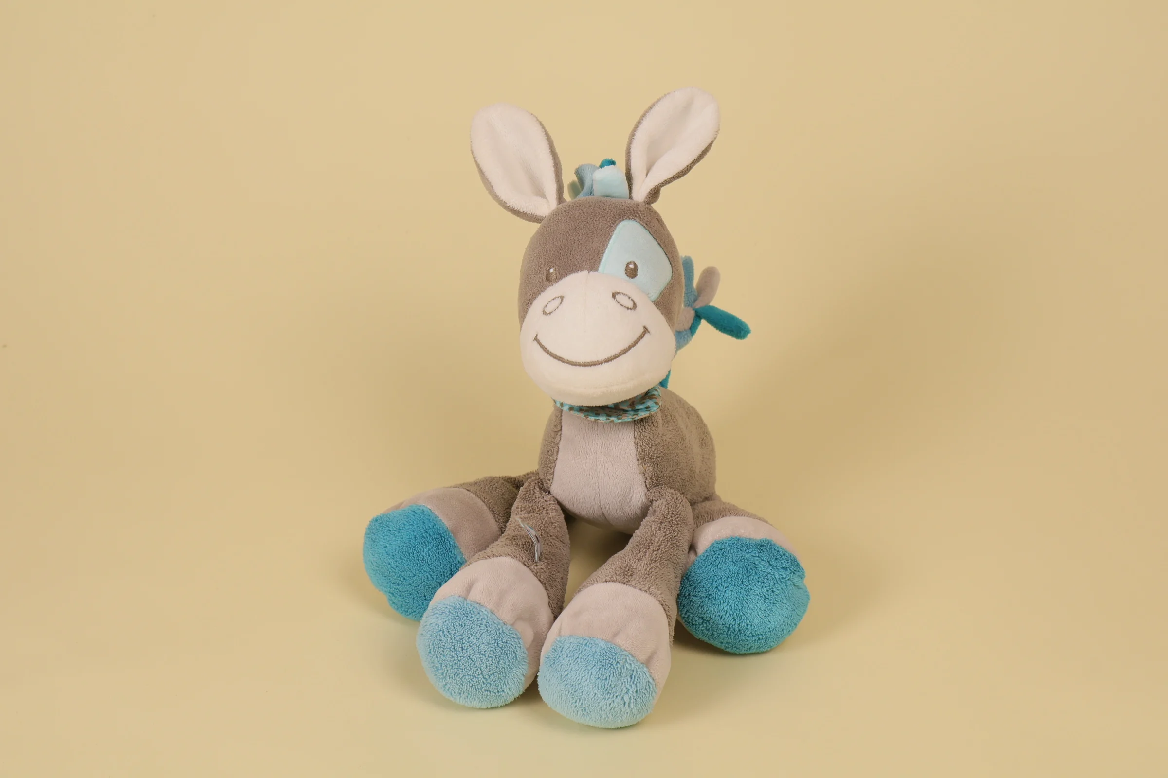 Doudou peluche âne bleu et gris Gaston avec bandana collection Gaston et Cyril marque Nattou 30 cm