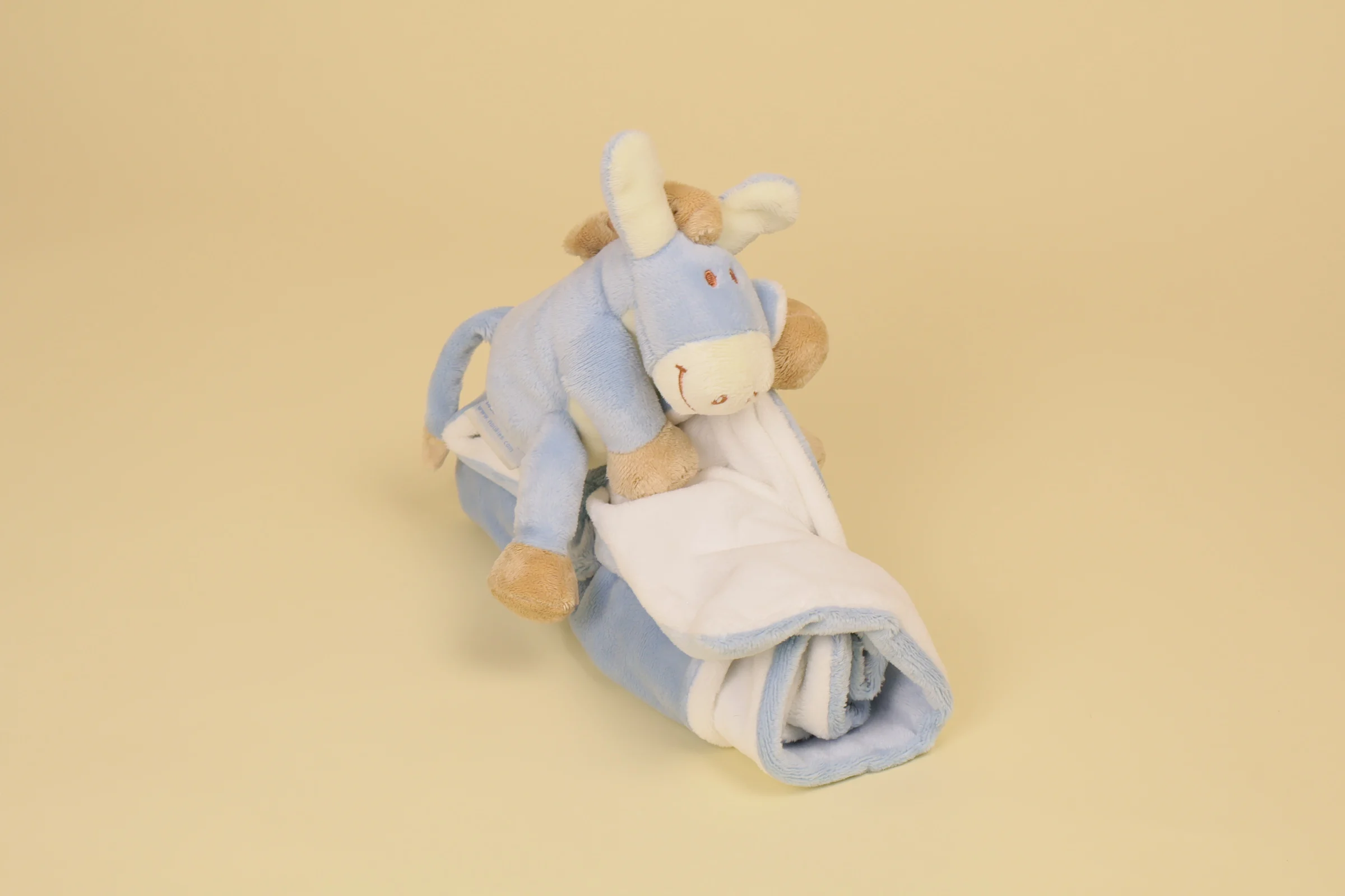 Doudou âne Paco avec couverture bleue et blanche épi de blé brodé marque Noukie's collection Paco Veloudoux