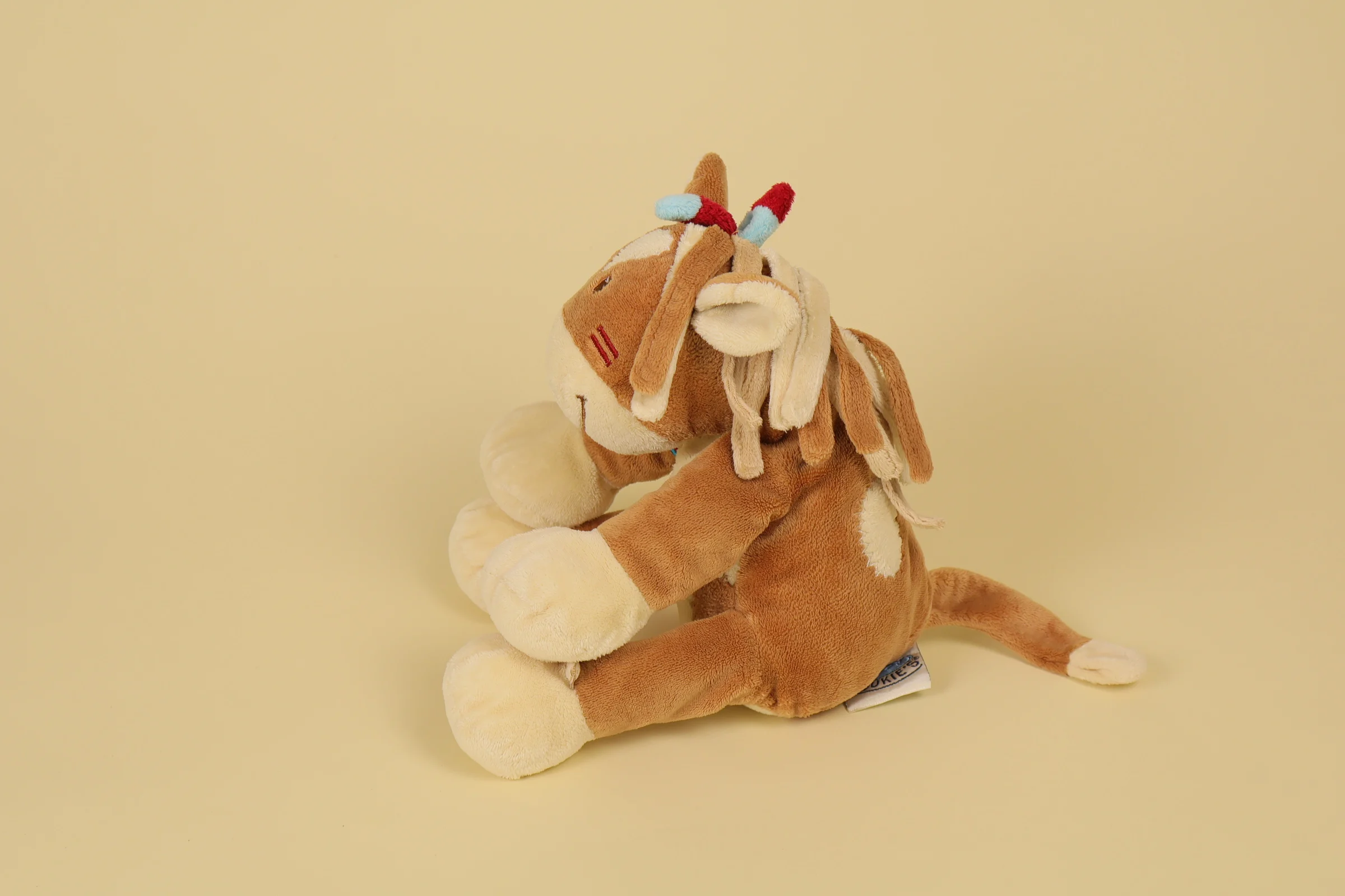 profil Doudou peluche cheval indien marron et beige Pinto collection Pinto et Kaya marque Noukie's 21 cm