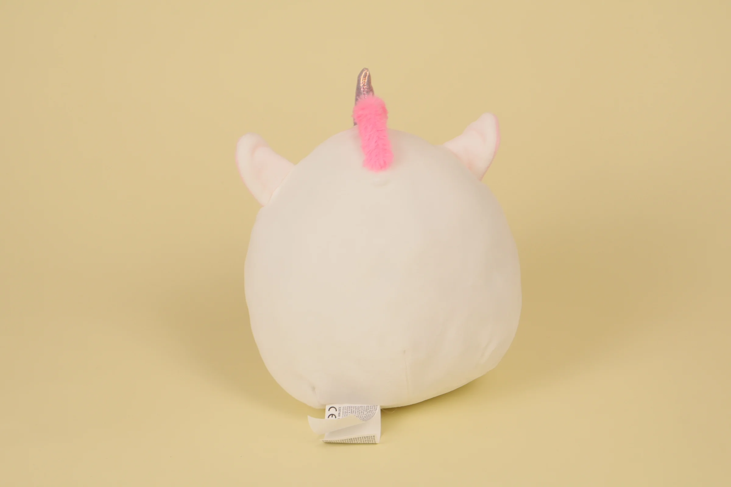 dos Peluche coussin licorne blanc et rose moelleux 22 cm marque HTI