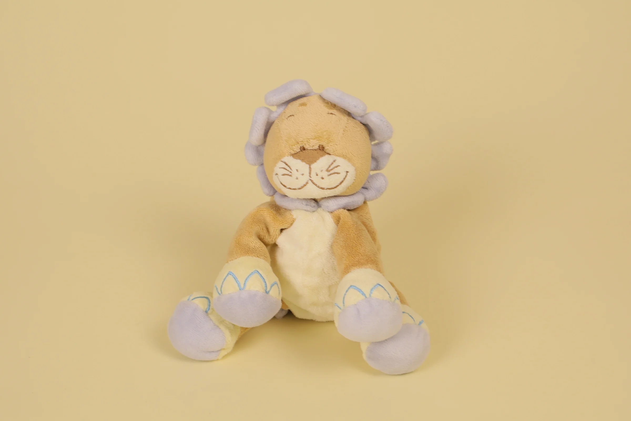 Petit doudou lion marron beige et parme 15 cm marque Bengy