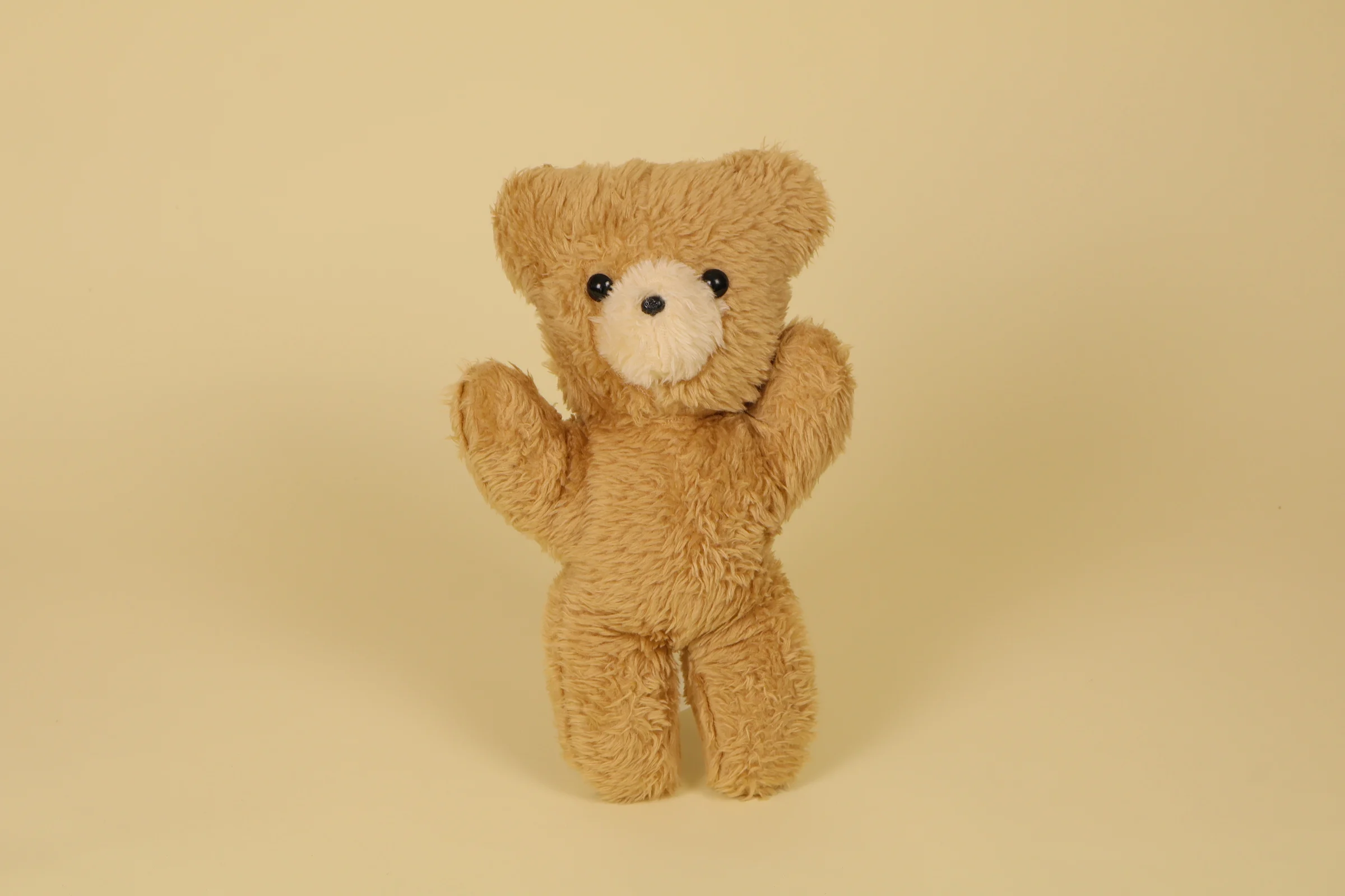 Peluche ours beige truffe crème yeux billes noirs marque Boulgom 33 cm