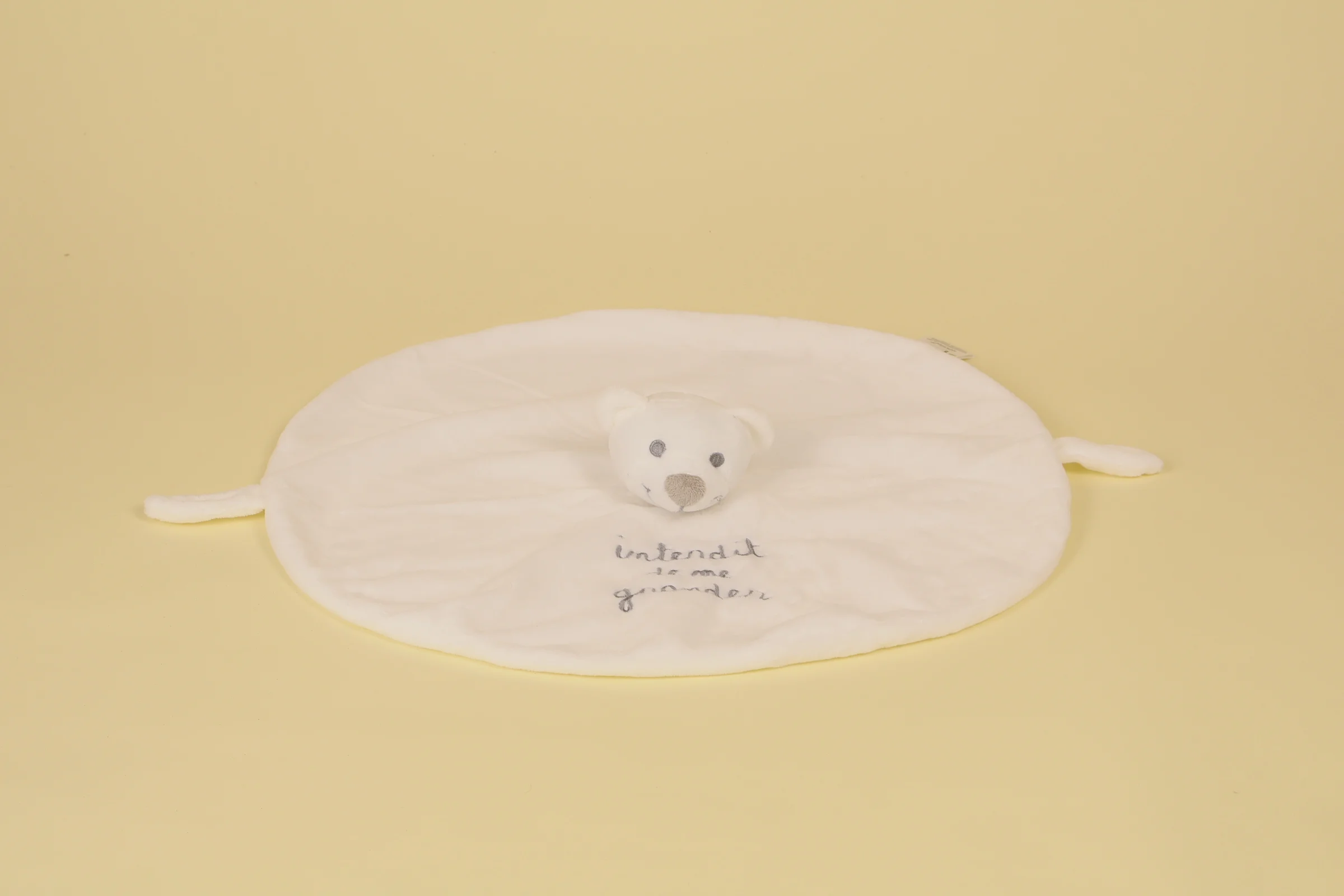 Doudou plat ours blanc forme ovale marque Interdit de me Gronder