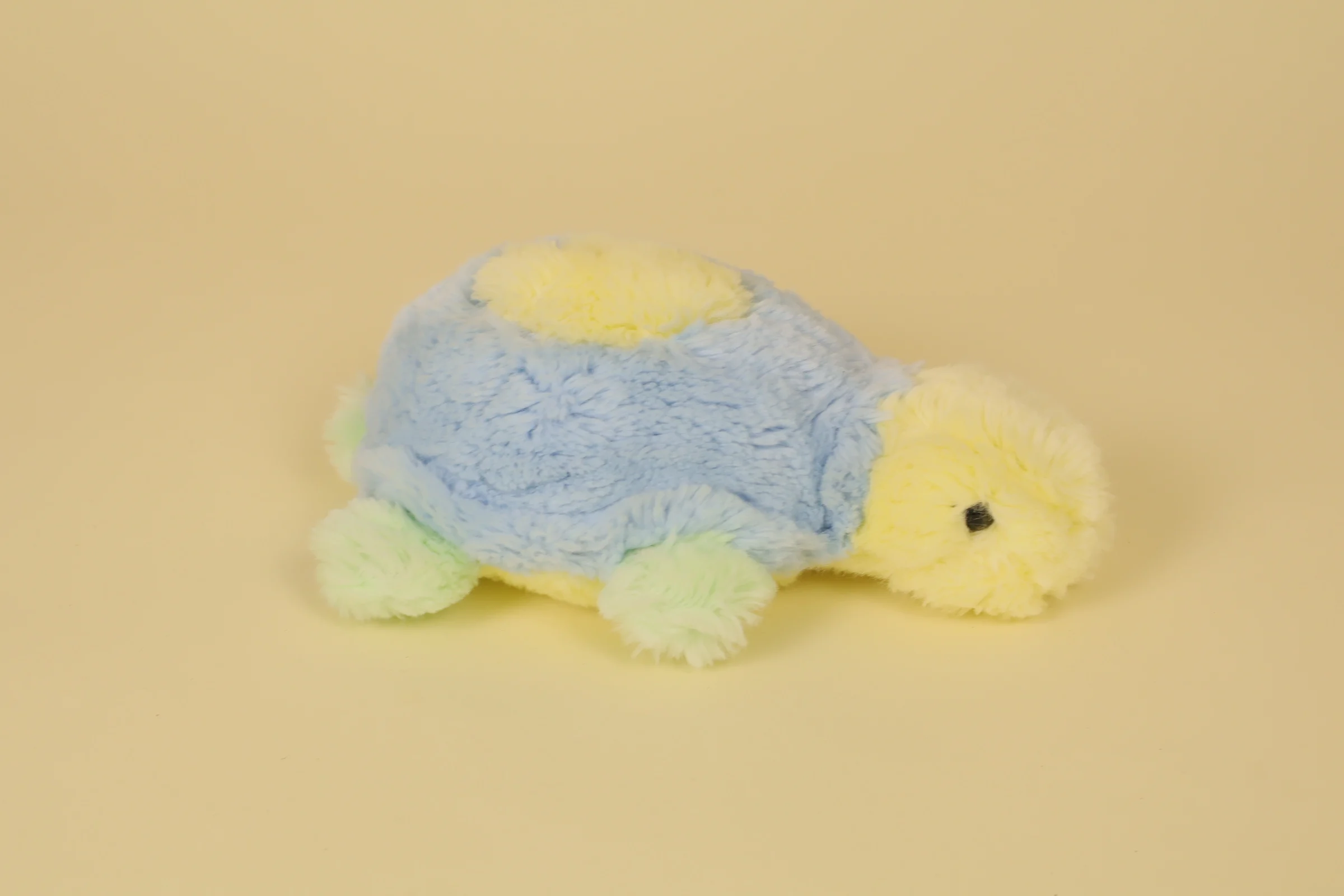 Peluche tortue multicolore bleu jaune et vert marque Nounours 23 cm vintage