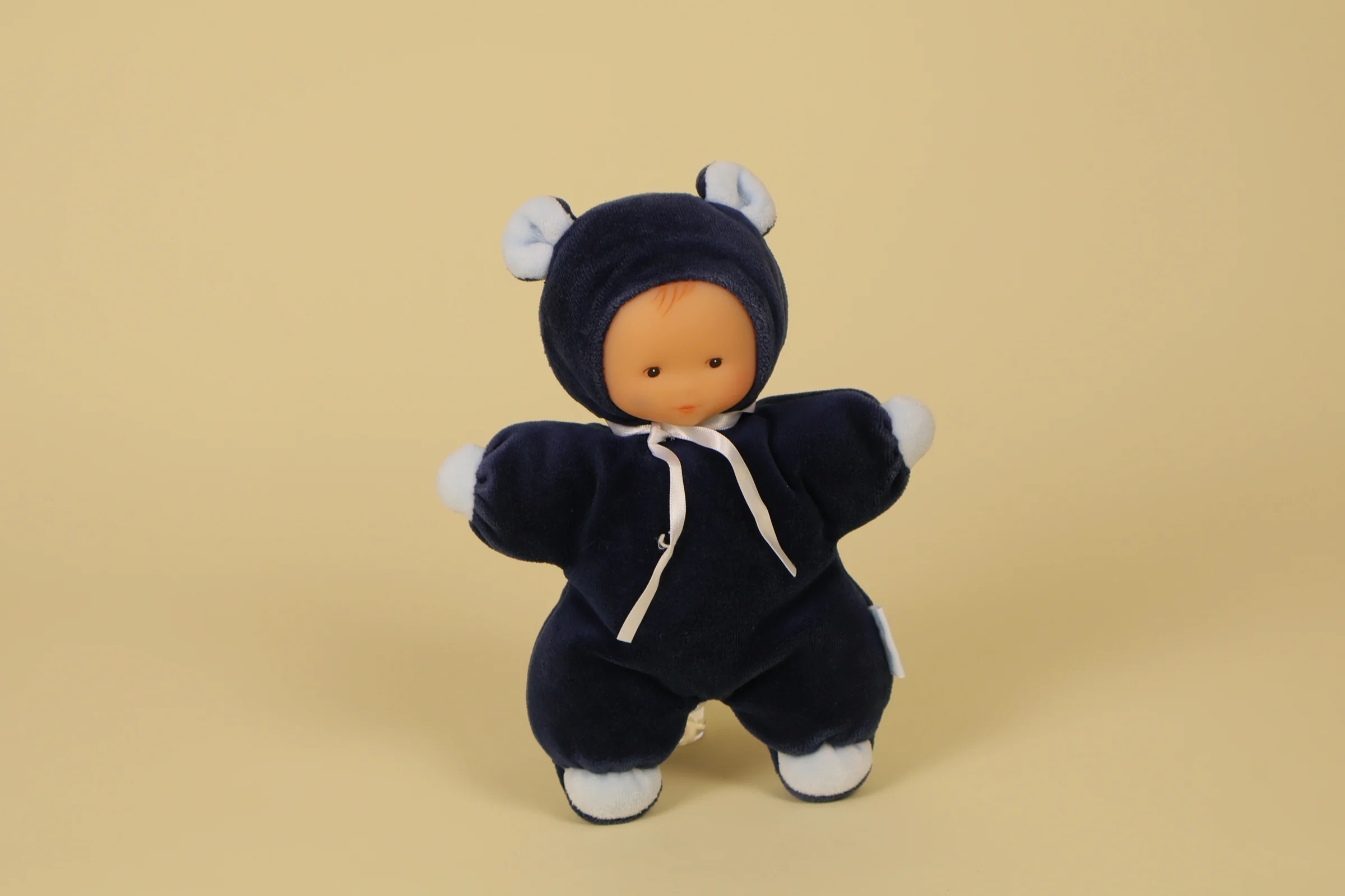 Doudou poupée déguisée en ours bleu marine marque Corolle 23 cm avec bruit grelot