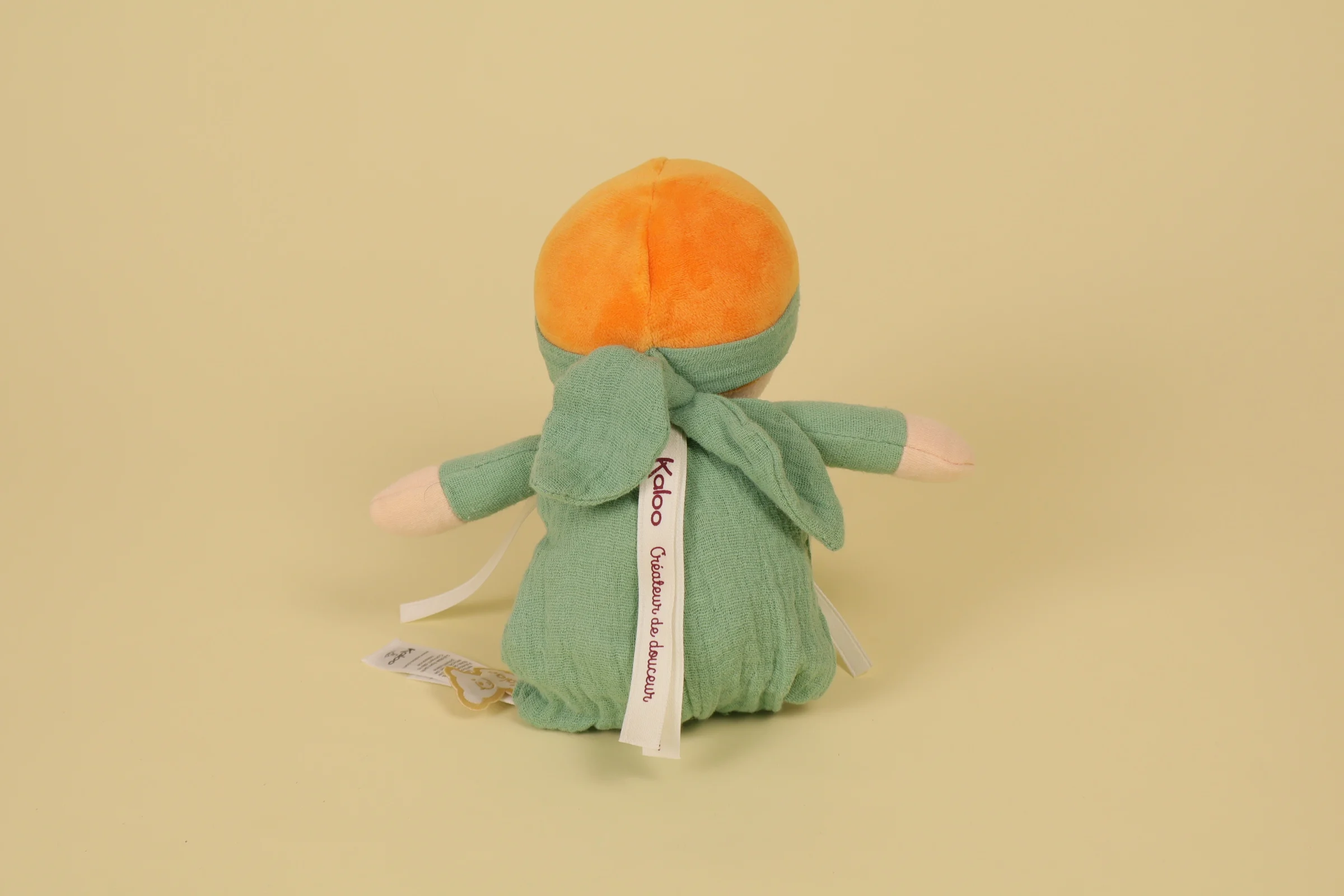 dos Poupée de chiffon fille Tendresse Olivia 25 cm avec combinaison et bandeau verts marque Kaloo