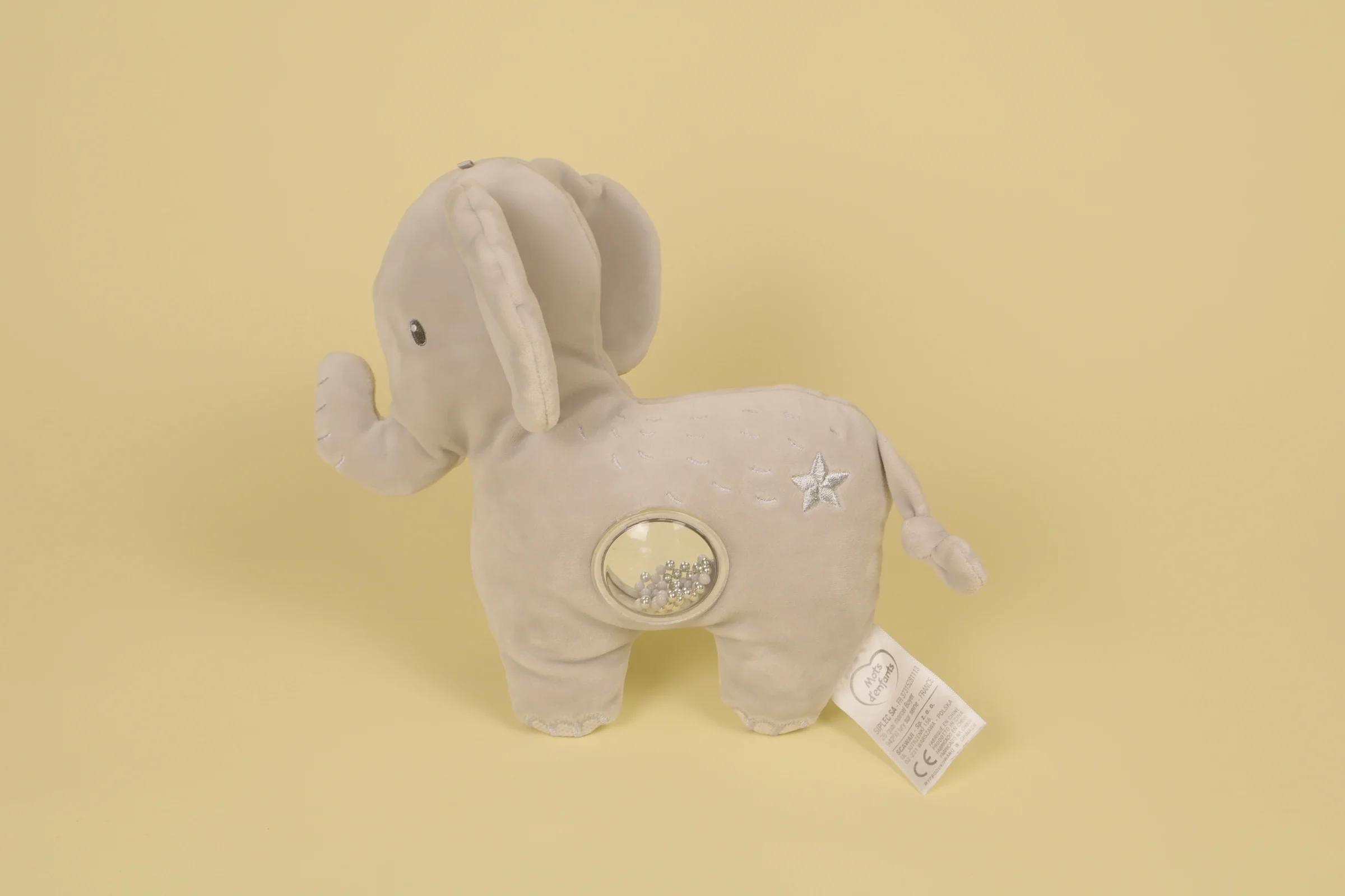recto Doudou peluche éléphant d'activité gris avec miroir souple incassable et demi-sphère transparente contenant des billes de couleur marque Mots d'Enfants