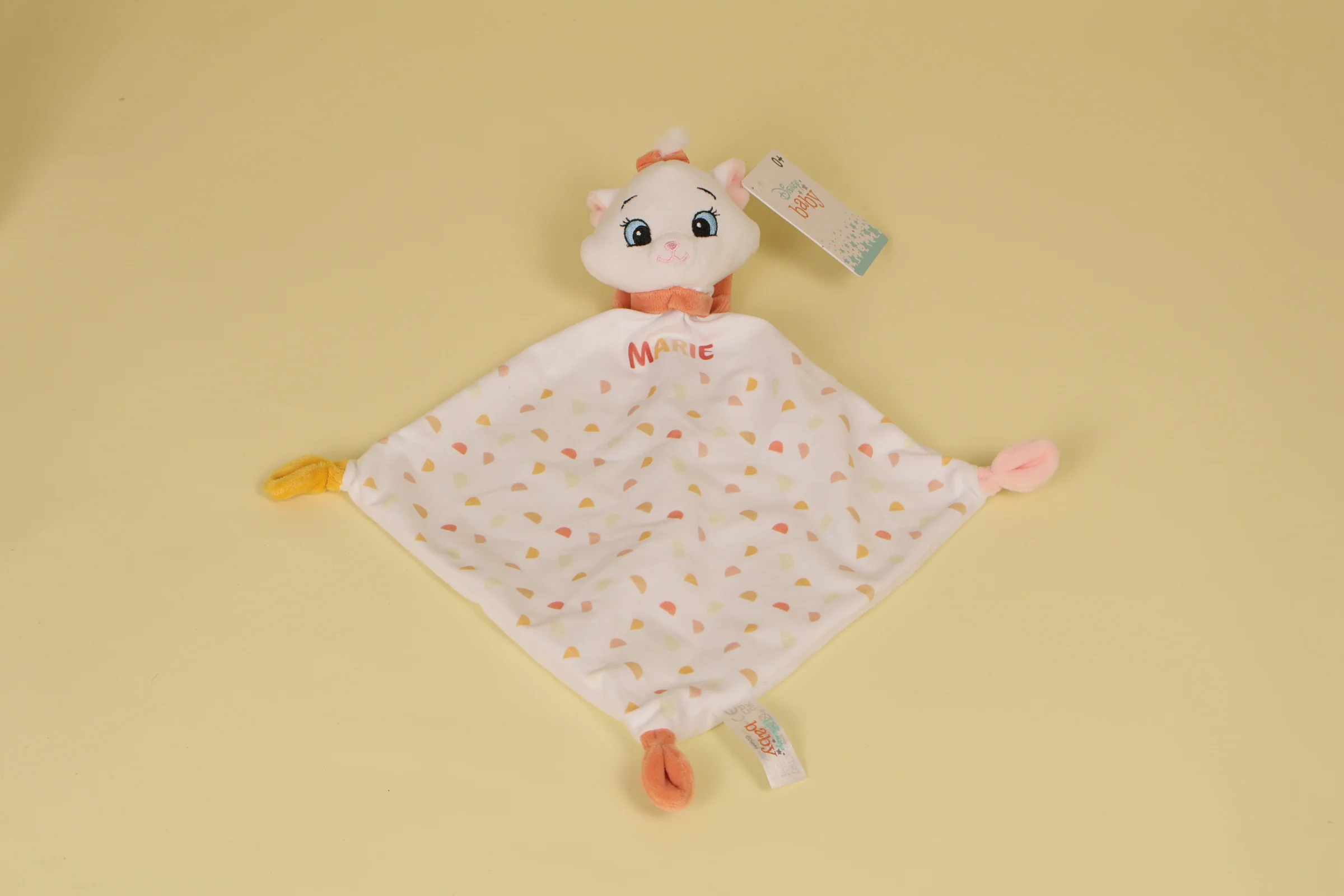 Doudou chat Marie plat losange blanc et saumon avec motifs imprimes vintage 2021 2023 marque Disney