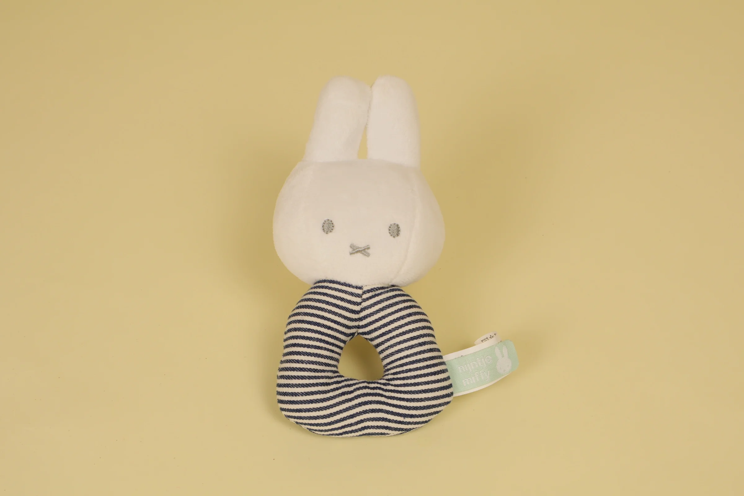 Hochet lapin Miffy raye bleu et blanc avec bruit de grelot marque Nijntje Tiamo