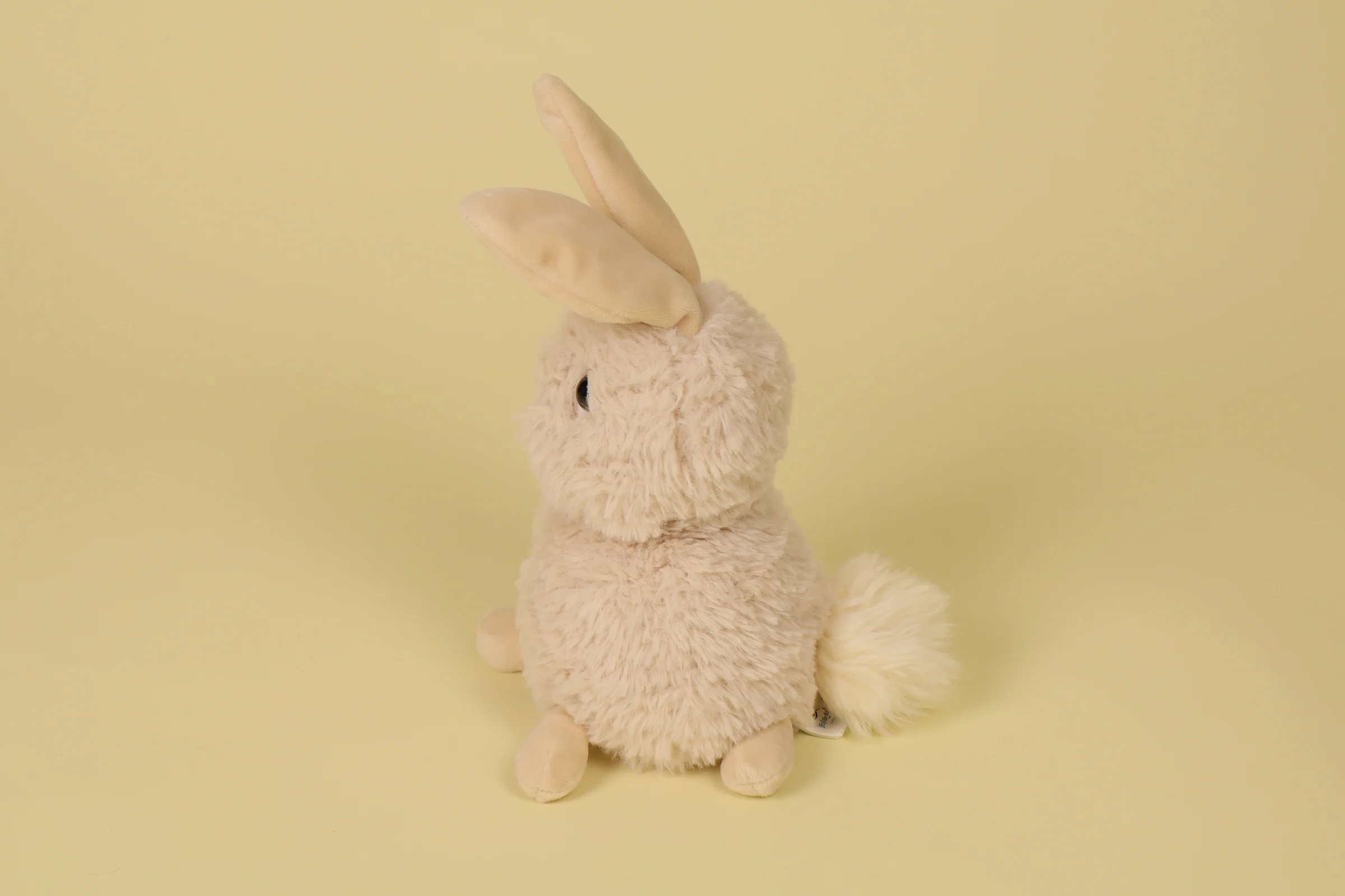 profil Peluche lapin Nuzzables Rabbit beige de 17 cm collection 2022 de la marque Jellycat