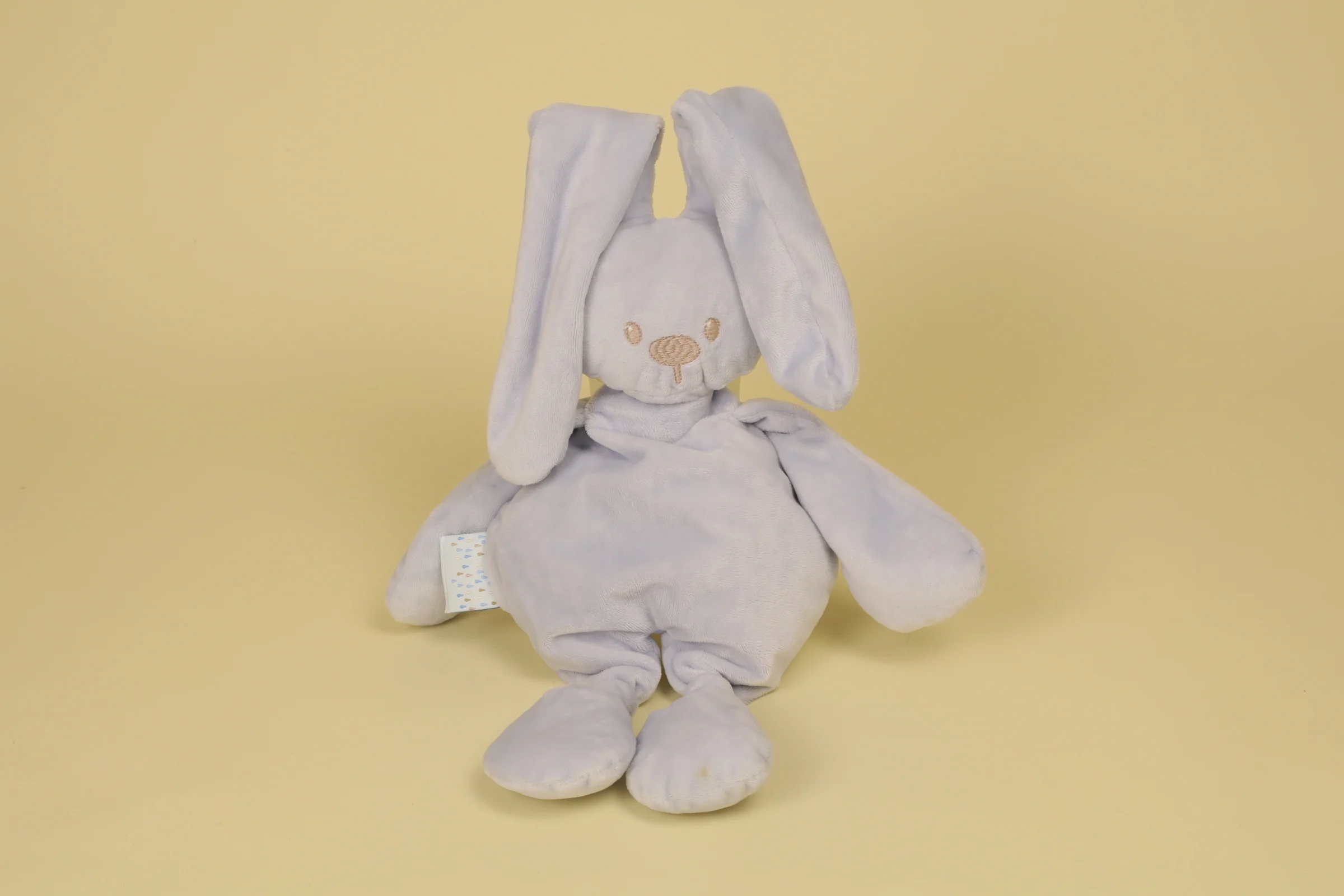 Doudou peluche lapin bleu clair visage brode beige 33 cm collection Lapidou marque Nattou
