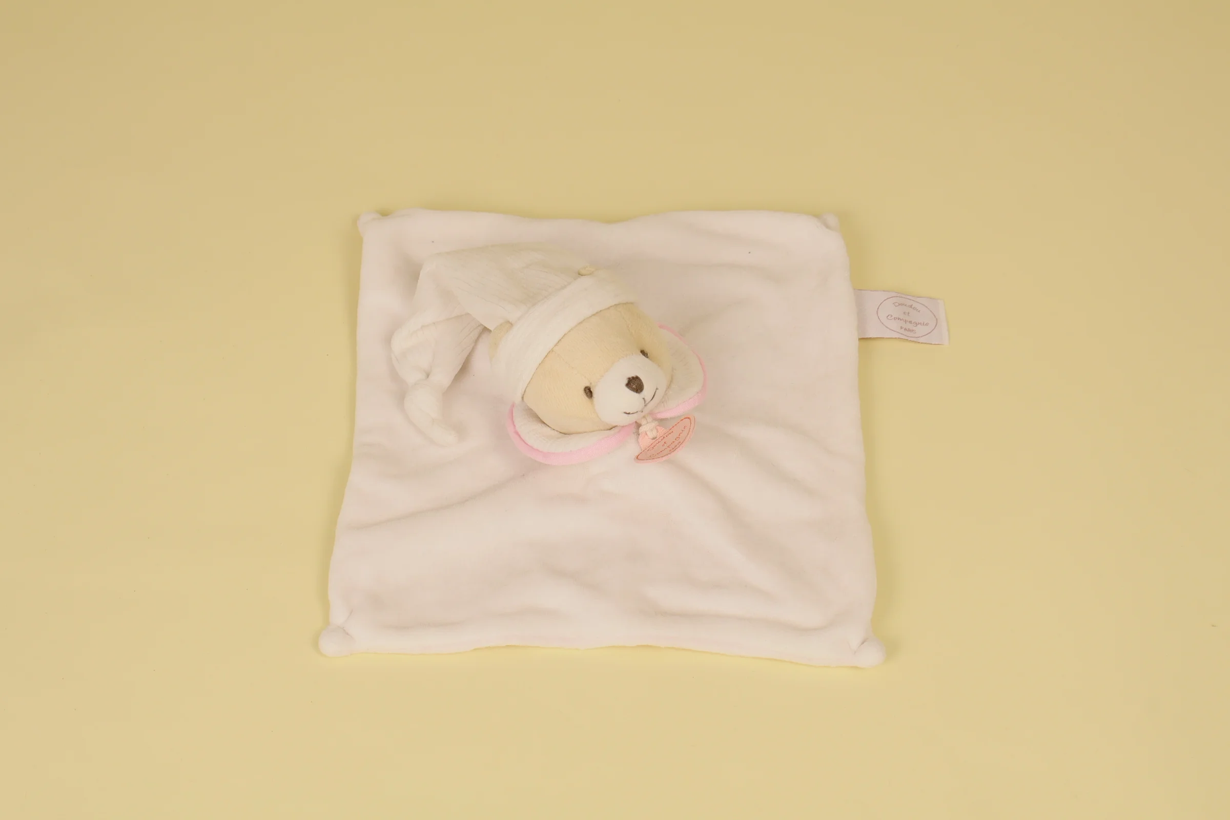 Doudou Ours plat blanc avec col au liseré rose collection L'Original 2000 marque Doudou et Compagnie