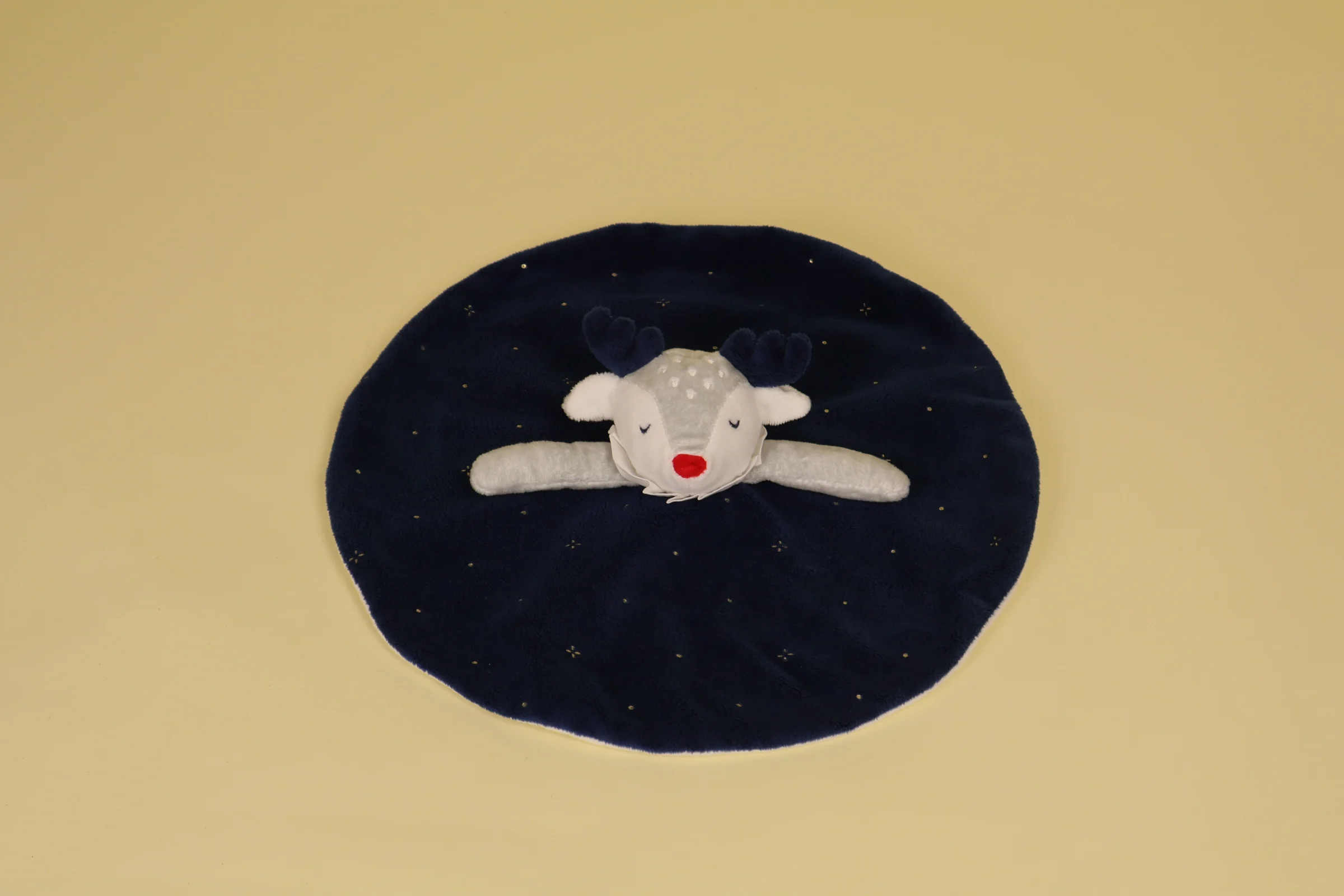 Doudou Renne Cerf Plat bleu marine paillete d'etoiles avec sa collerette et son petit nez rouge Annee 2019 2020 Marque OBAIBI